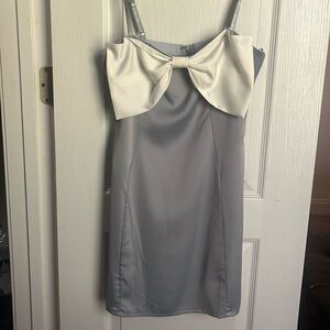 Shop these three, silky light blue mini dress w/ white bow accent, size medium